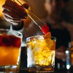 Bartender preparing cocktails behind the bar