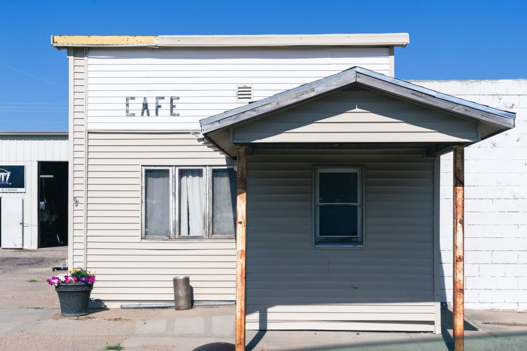 Old cafe on a quiet main street, the kind of spot you look at when you open a restaurant in a small town