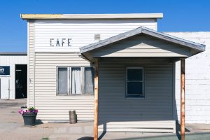 Old cafe on a quiet main street, the kind of spot you look at when you open a restaurant in a small town